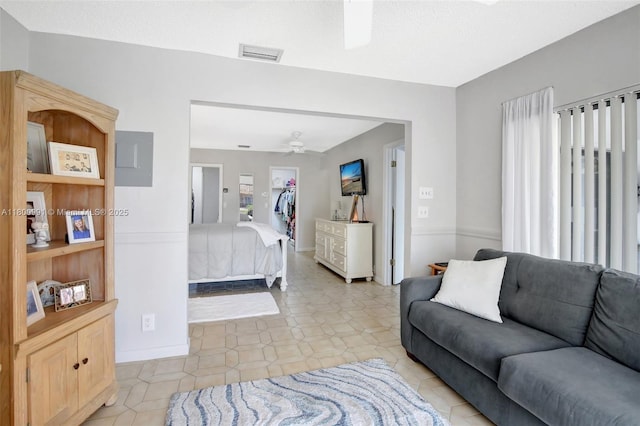 6001 SW 18th St, Plantation, FL 33317 - bedroom with a ceiling fan, a spacious closet, light tile patterned floors, baseboards, and a closet