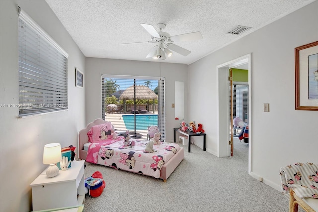 6001 SW 18th St, Plantation, FL 33317 - bedroom with access to outside, carpet, a textured ceiling, a ceiling fan, and baseboards