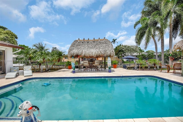 6001 SW 18th St, Plantation, FL 33317 - outdoor pool with a gazebo, outdoor dining space, a patio, and fence