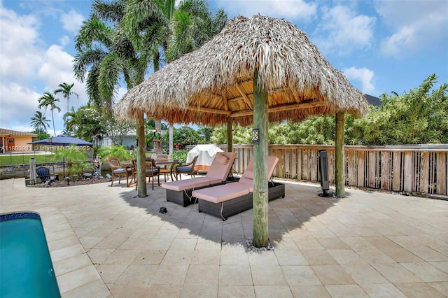 6001 SW 18th St, Plantation, FL 33317 - view of patio with a gazebo, fence, and an outdoor hangout area