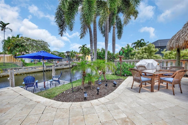 6001 SW 18th St, Plantation, FL 33317 - view of patio featuring a water view and fence