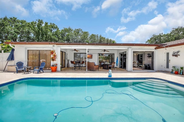 6001 SW 18th St, Plantation, FL 33317 - swimming pool with a ceiling fan, a patio area, and an outdoor hangout area