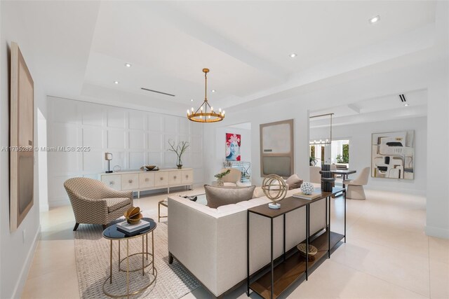 1415 Madrid St, Coral Gables, FL 33134 - living room featuring a tray ceiling, a chandelier, recessed lighting, baseboards, and light tile patterned floors