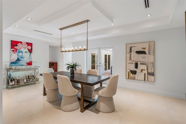 1415 Madrid St, Coral Gables, FL 33134 - dining room featuring a tray ceiling, french doors, recessed lighting, and light tile patterned flooring