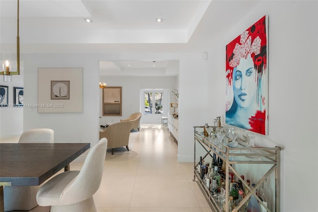 1415 Madrid St, Coral Gables, FL 33134 - dining space with a tray ceiling, recessed lighting, a chandelier, and baseboards