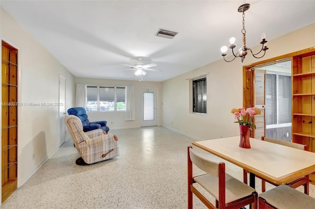 1920 SW 65th Ter, North Lauderdale, FL 33068 - living area featuring baseboards, speckled floor, a chandelier, and ceiling fan