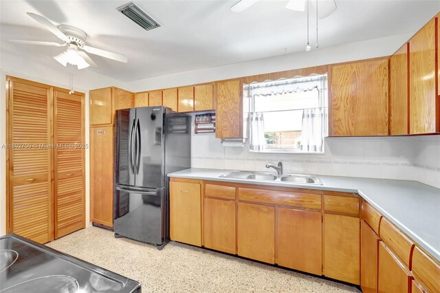1920 SW 65th Ter, North Lauderdale, FL 33068 - kitchen featuring ceiling fan, freestanding refrigerator, a sink, and light countertops