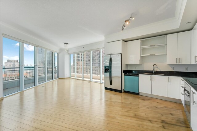 60 SW 13th St Unit 2100, Miami, FL 33130 - kitchen with stainless steel fridge with ice dispenser, dishwashing machine, open shelves, dark countertops, and a sink