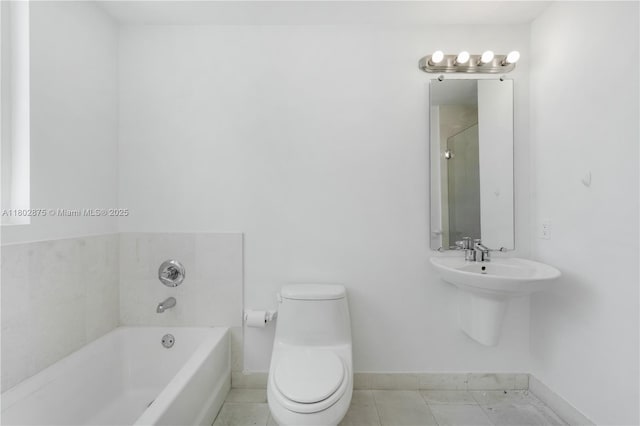 60 SW 13th St Unit 2100, Miami, FL 33130 - full bath featuring baseboards, a bath, toilet, and tile patterned floors