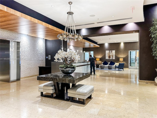 60 SW 13th St Unit 2100, Miami, FL 33130 - dining space with a chandelier and baseboards