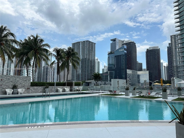 90 SW 3rd St Unit 1909, Miami, FL 33130 - community pool with a skyline view and fence