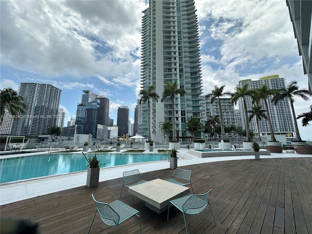 90 SW 3rd St Unit 1909, Miami, FL 33130 - community pool with a view of skyline and a deck