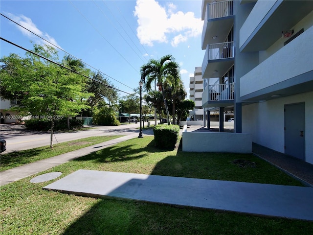 16518 NE 26th Ave Unit 305, North Miami Beach, FL 33160 - view of community with a yard