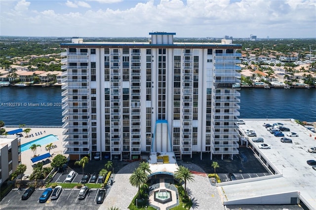 1500 S Ocean Dr Unit 12H, Hollywood, FL 33019 - view of apartment building / complex featuring uncovered parking and a water view