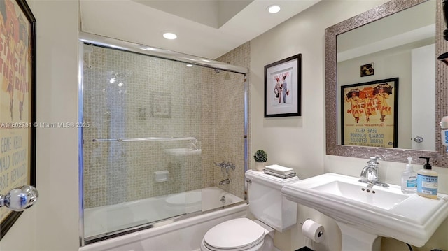 1500 S Ocean Dr Unit 12H, Hollywood, FL 33019 - full bathroom featuring recessed lighting, a sink, toilet, and enclosed tub / shower combo