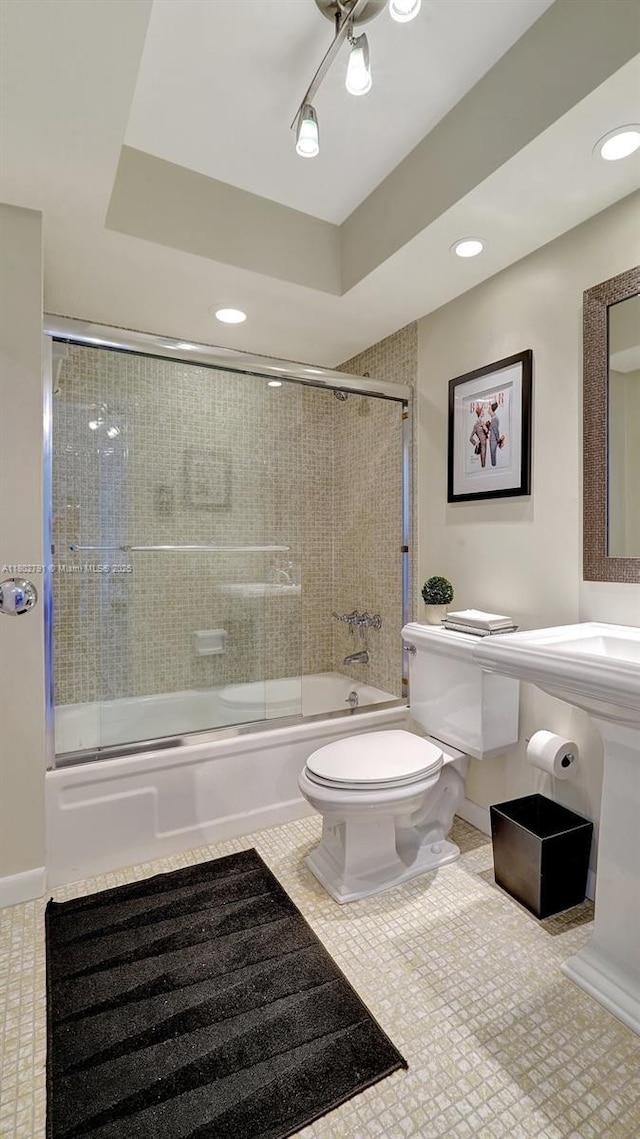 1500 S Ocean Dr Unit 12H, Hollywood, FL 33019 - bathroom featuring toilet, bath / shower combo with glass door, and recessed lighting
