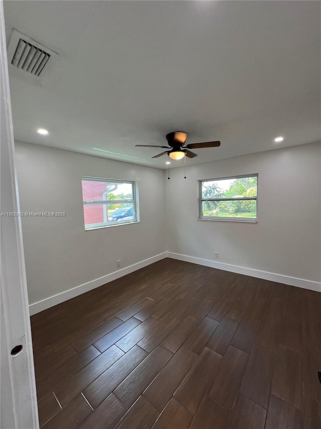 6391 SW 8th St, North Lauderdale, FL 33068 - unfurnished room with healthy amount of natural light, dark wood finished floors, a ceiling fan, baseboards, and recessed lighting