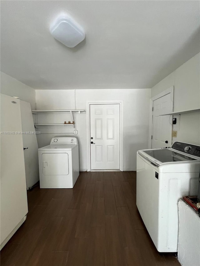 6391 SW 8th St, North Lauderdale, FL 33068 - washroom featuring washer and clothes dryer and dark wood-type flooring