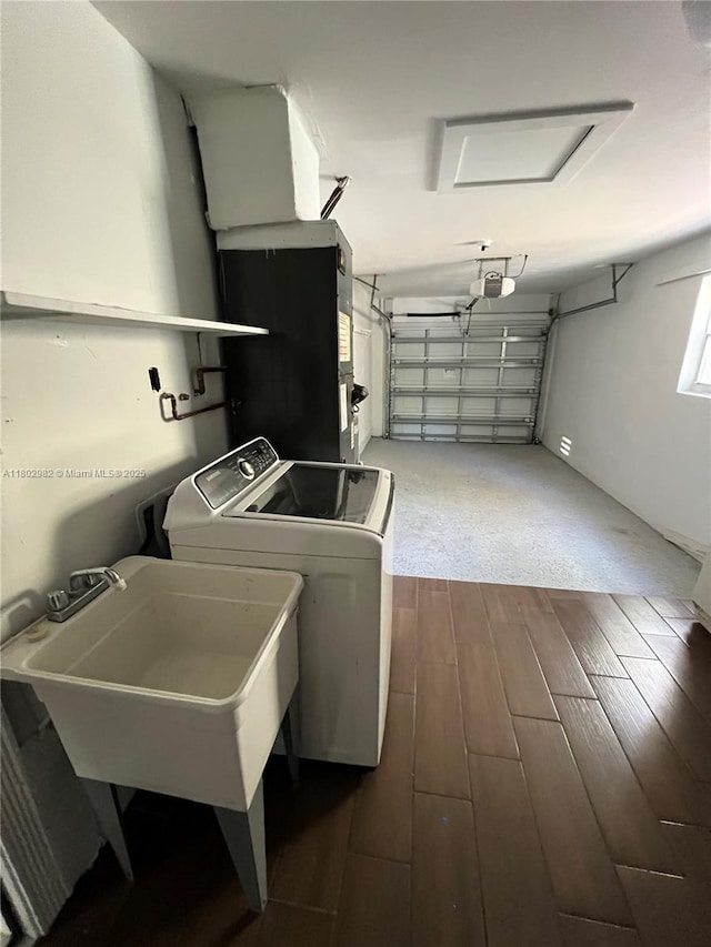 6391 SW 8th St, North Lauderdale, FL 33068 - clothes washing area with wood finished floors, separate washer and dryer, attic access, and heating unit