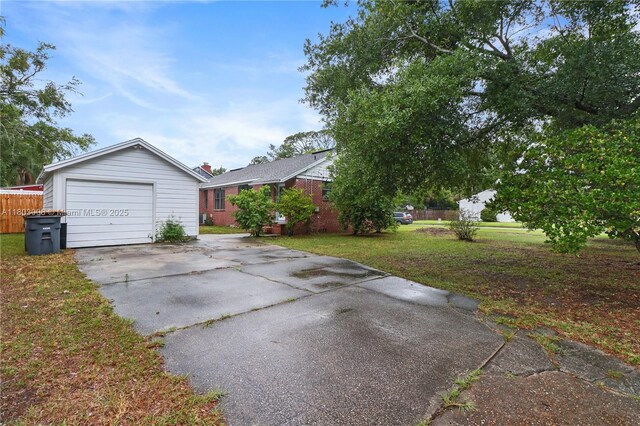 2196 Traymore Rd, Jacksonville, FL 32207 - view of front of property with driveway, a front yard, and a garage