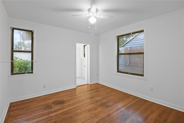 2196 Traymore Rd, Jacksonville, FL 32207 - unfurnished room featuring wood finished floors, baseboards, and a ceiling fan