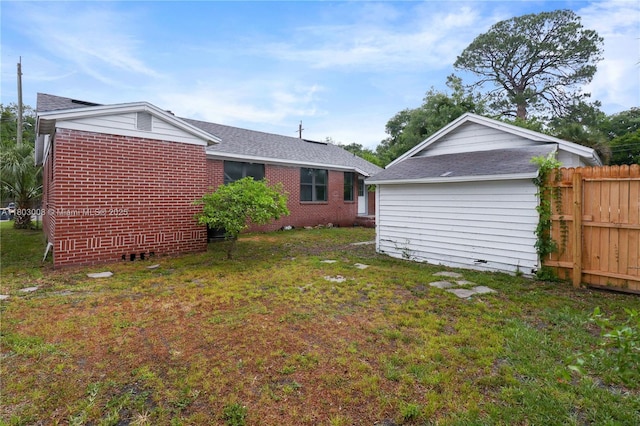 2196 Traymore Rd, Jacksonville, FL 32207 - rear view of house featuring brick siding