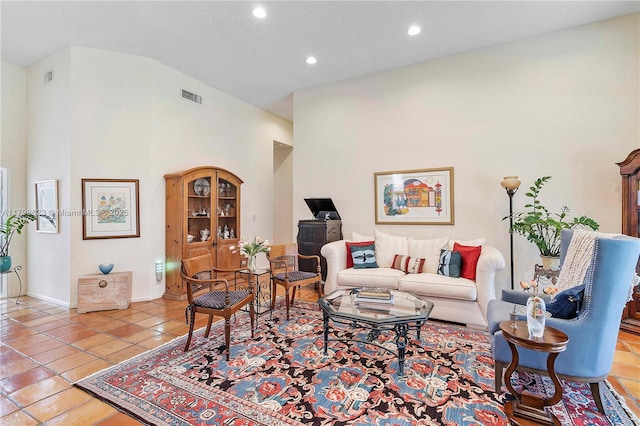 5425 NW 86th Ter, Coral Springs, FL 33067 - living area with recessed lighting, light tile patterned floors, baseboards, and high vaulted ceiling