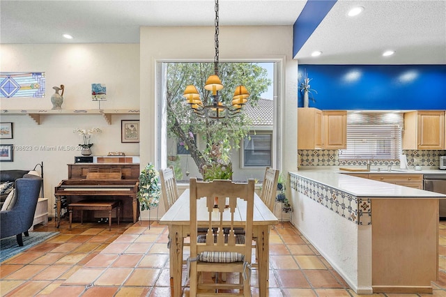 5425 NW 86th Ter, Coral Springs, FL 33067 - dining room with a chandelier, recessed lighting, and a textured ceiling