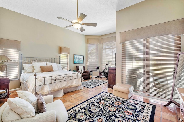 5425 NW 86th Ter, Coral Springs, FL 33067 - bedroom with light tile patterned floors and ceiling fan