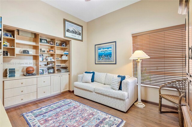 5425 NW 86th Ter, Coral Springs, FL 33067 - living area featuring light wood-type flooring and baseboards