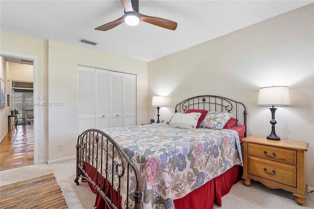 5425 NW 86th Ter, Coral Springs, FL 33067 - bedroom with light colored carpet, a closet, a ceiling fan, and baseboards