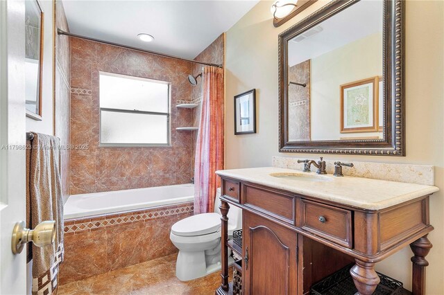 5425 NW 86th Ter, Coral Springs, FL 33067 - full bath featuring tiled shower / bath combo, toilet, tile patterned flooring, and vanity