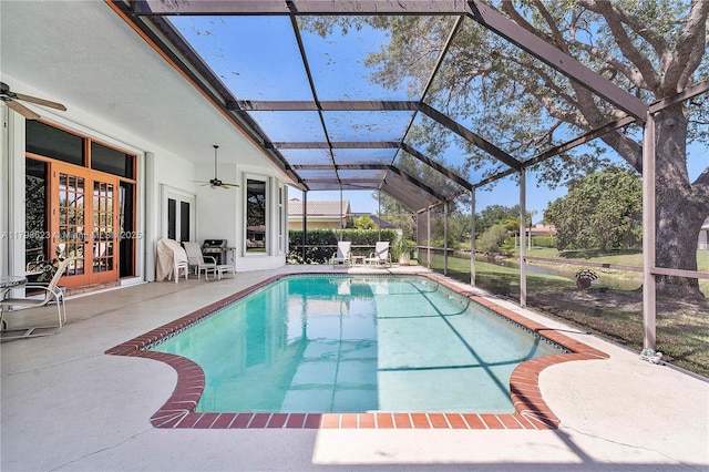 5425 NW 86th Ter, Coral Springs, FL 33067 - swimming pool with french doors, a ceiling fan, a patio, and a lanai