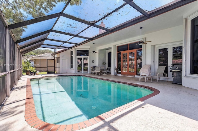 5425 NW 86th Ter, Coral Springs, FL 33067 - swimming pool with french doors, ceiling fan, a patio, grilling area, and a lanai