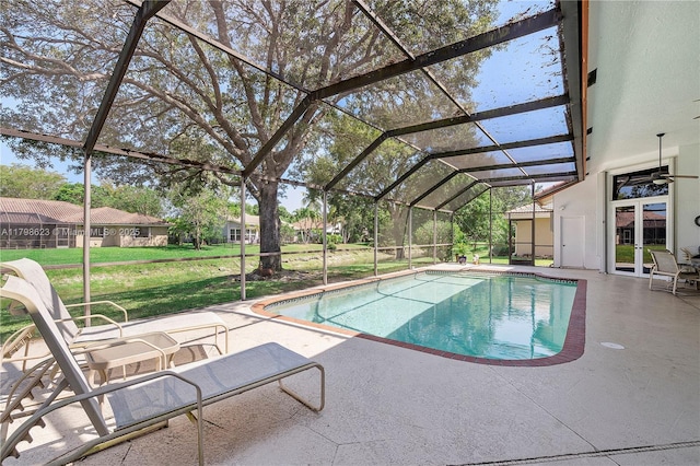5425 NW 86th Ter, Coral Springs, FL 33067 - swimming pool with french doors, a patio area, and a yard