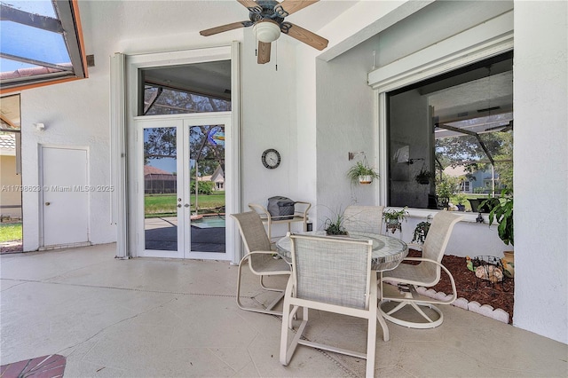 5425 NW 86th Ter, Coral Springs, FL 33067 - view of patio / terrace featuring french doors, ceiling fan, and outdoor dining space