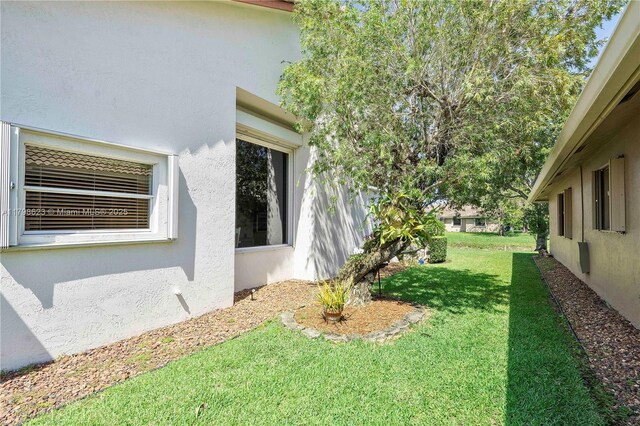 5425 NW 86th Ter, Coral Springs, FL 33067 - view of green lawn