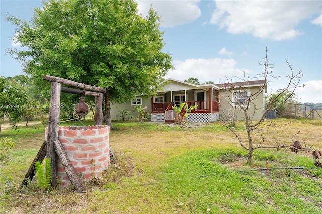 260 Taft Blvd, Clewiston, FL 33440 - view of yard with a porch