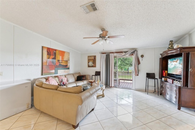 260 Taft Blvd, Clewiston, FL 33440 - living area with ceiling fan, light tile patterned flooring, a textured ceiling, and ornamental molding