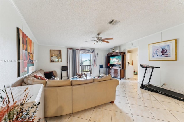260 Taft Blvd, Clewiston, FL 33440 - living area with ceiling fan, a textured ceiling, light tile patterned floors, and ornamental molding