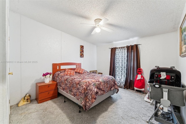 260 Taft Blvd, Clewiston, FL 33440 - carpeted bedroom featuring a textured ceiling and a ceiling fan