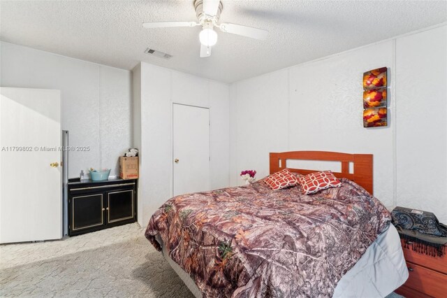 260 Taft Blvd, Clewiston, FL 33440 - bedroom with carpet floors, a textured ceiling, and ceiling fan