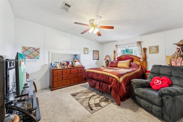 260 Taft Blvd, Clewiston, FL 33440 - carpeted bedroom with a textured ceiling and ceiling fan