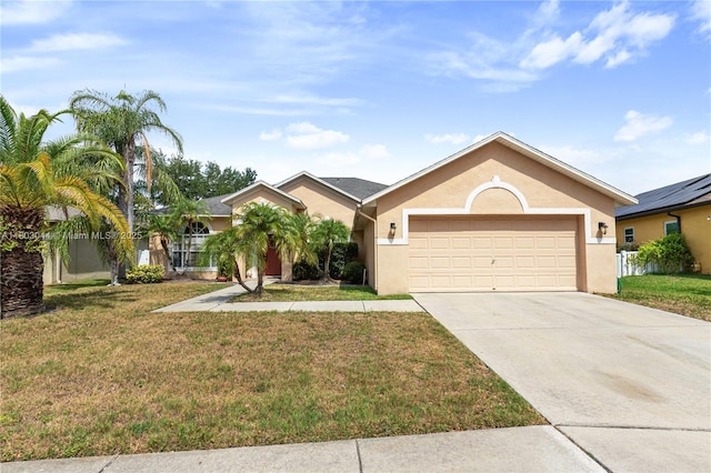 19106 Cormorant Cove Pl, Tampa, FL 33647 - ranch-style home with a garage, stucco siding, a front yard, and driveway