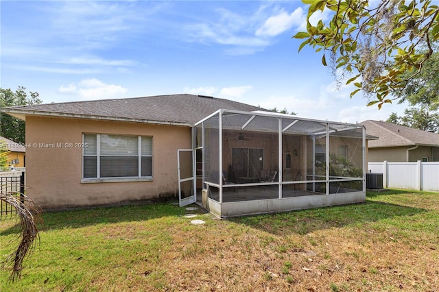 19106 Cormorant Cove Pl, Tampa, FL 33647 - back of property featuring central AC, stucco siding, and roof with shingles