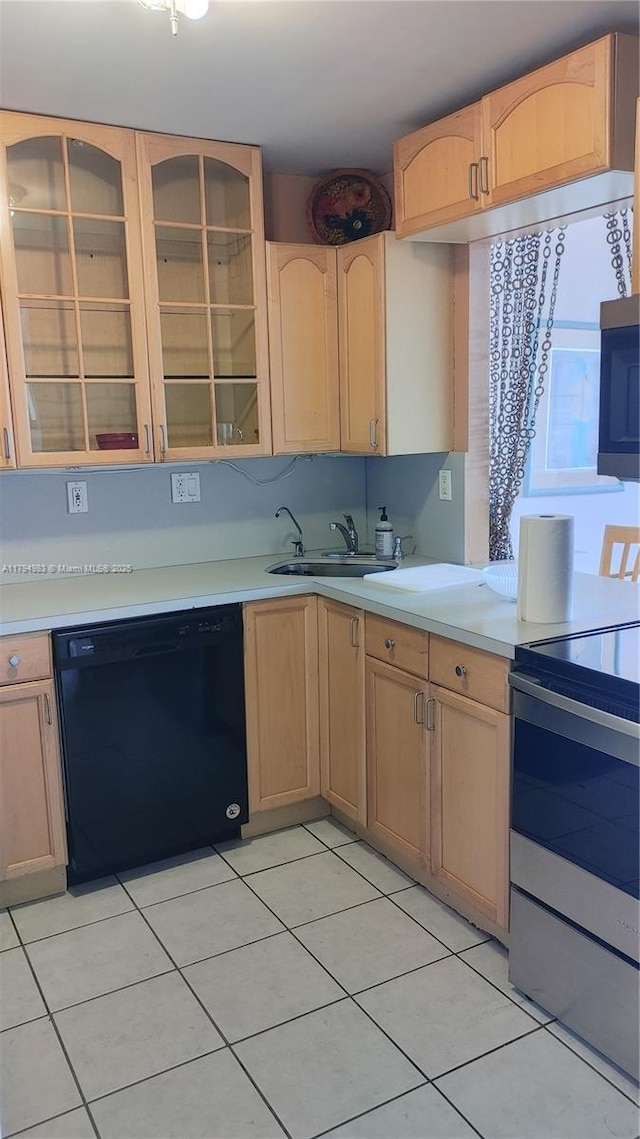 2101 Atlantic Shores Blvd Unit 415, Hallandale Beach, FL 33009 - kitchen featuring stainless steel appliances, light countertops, glass insert cabinets, and light brown cabinets