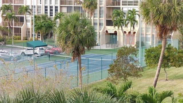 2101 Atlantic Shores Blvd Unit 415, Hallandale Beach, FL 33009 - view of tennis court with fence