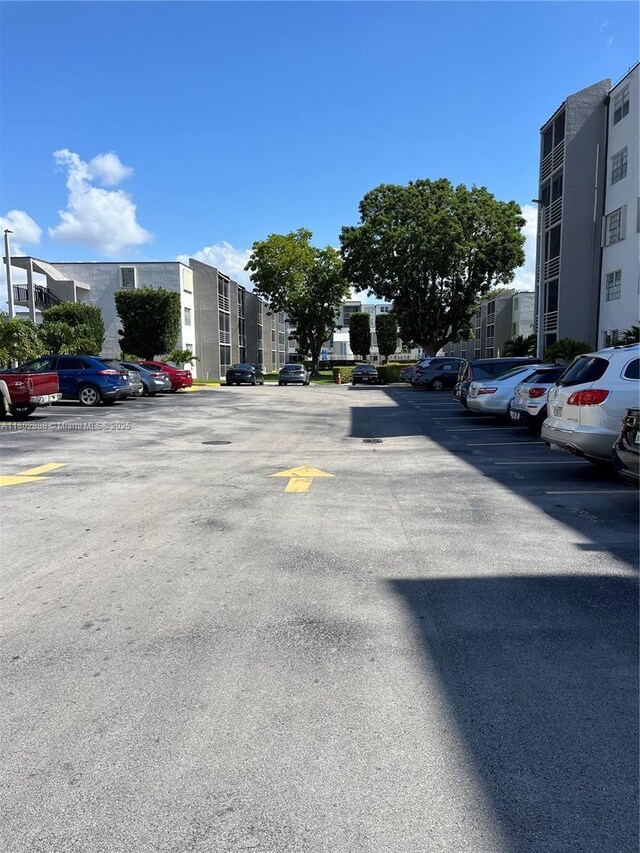 14155 SW 87th St Unit E110, Miami, FL 33183 - view of uncovered parking lot