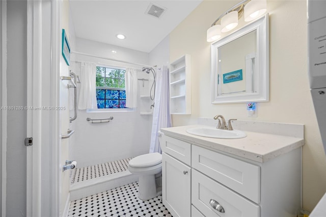 full bathroom with a shower stall, vanity, toilet, tile patterned floors, and recessed lighting