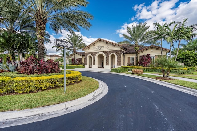 8894 W 34th Ave, Hialeah, FL 33018 - view of front facade with stucco siding and curved driveway